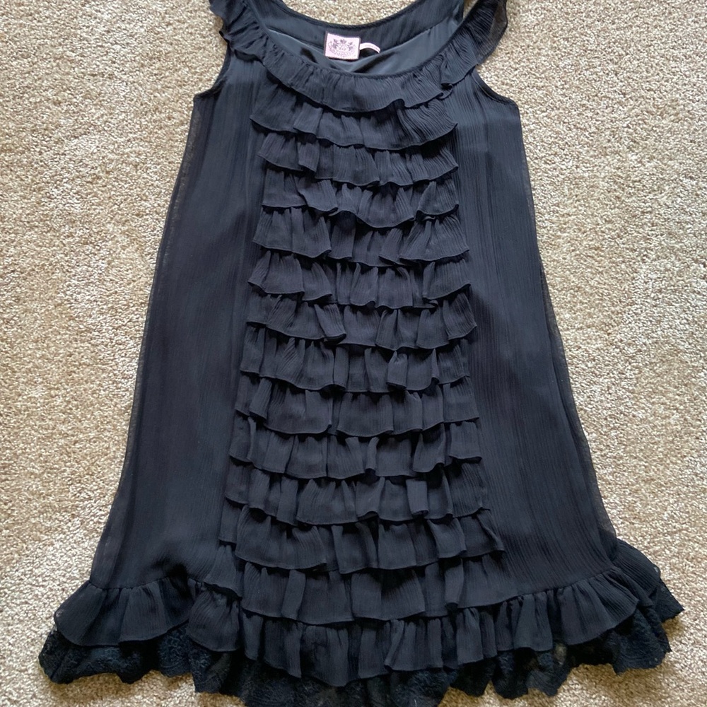 Very cute dress with ruffled detail on front and back